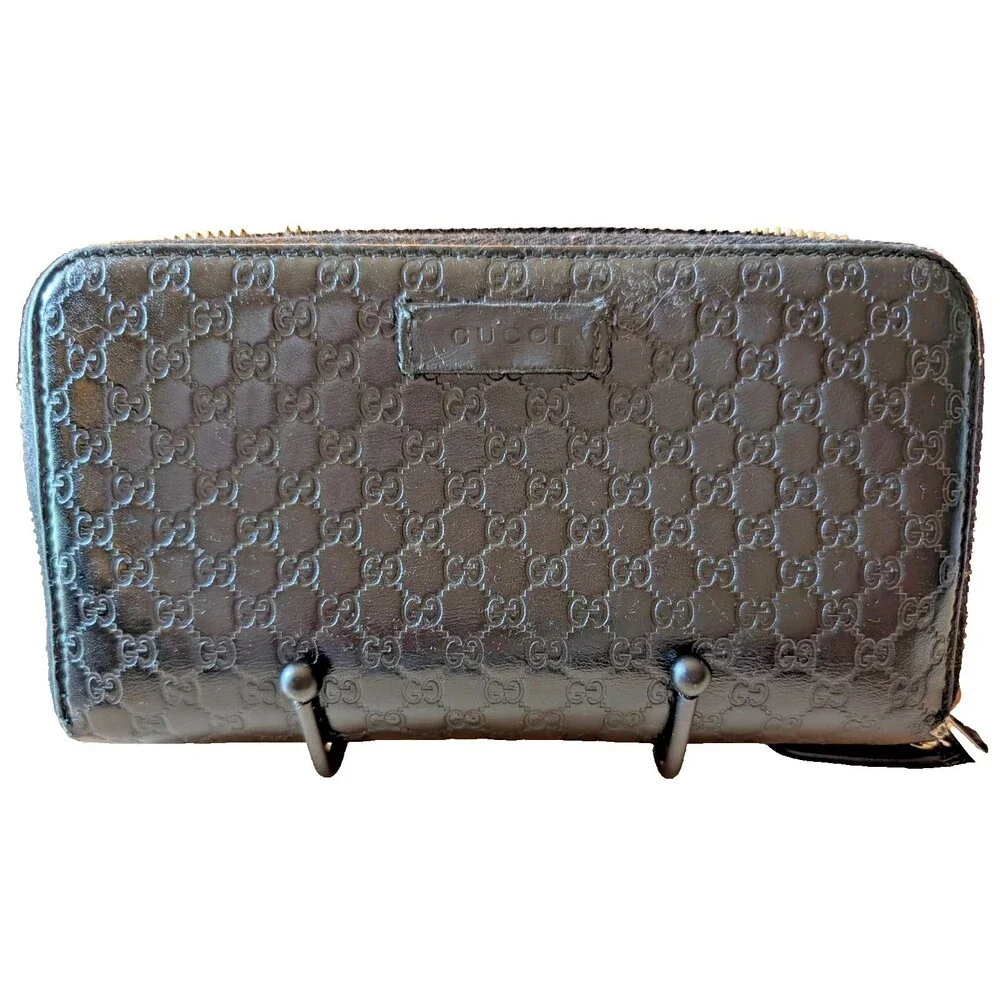 GUCCI Round Zip Micro Guccissima Wallet